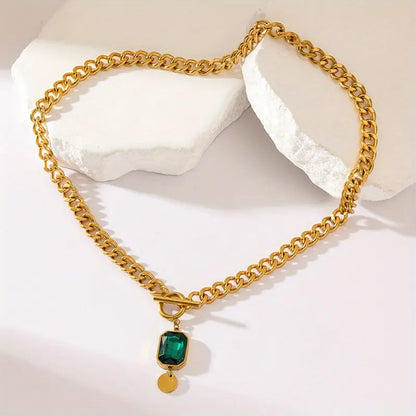 Grove schakelketting met smaragdhanger | Goud