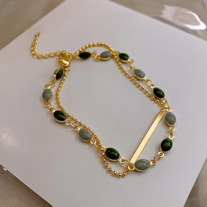 Olivia Moss dubbele armband | Goud