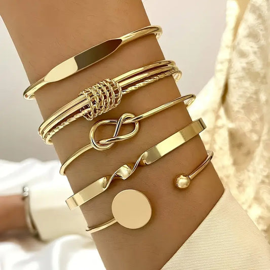 Elegante armbandenset met knoopmotief | Goud