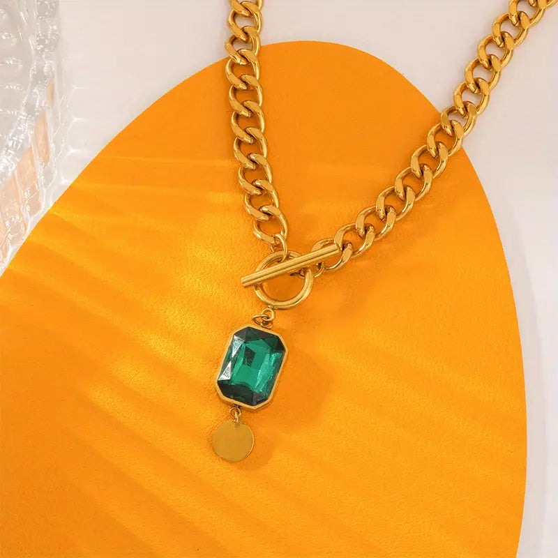 Grove schakelketting met smaragdhanger | Goud