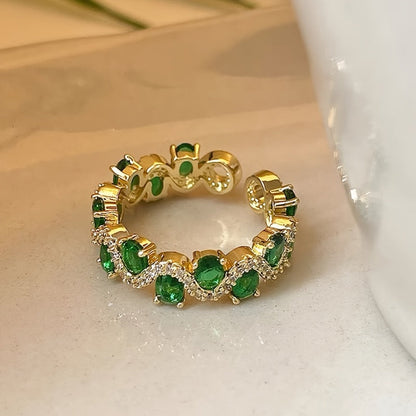 Calira sprankelende open ring met smaragd | Goud