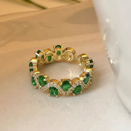 Calira sprankelende open ring met smaragd | Goud
