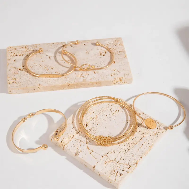 Elegante armbandenset met knoopmotief | Goud