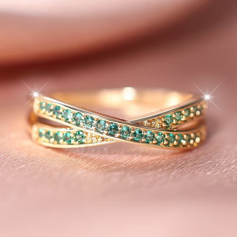 Ring met smaragd en vloeiende lijnen | Goud