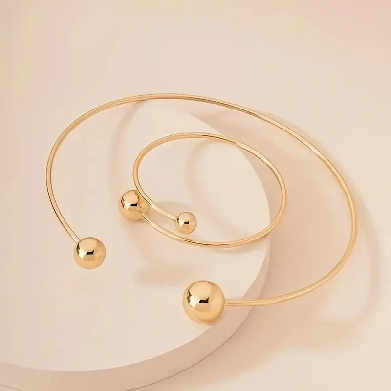 Minimalistische glansset met halsbandketting en open armband | Goud