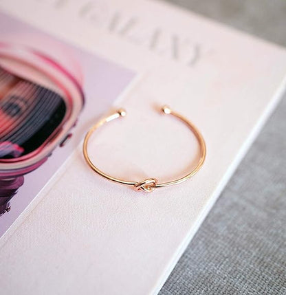 Liefdesknoop-armband met oneindigheidssymbool | Goud