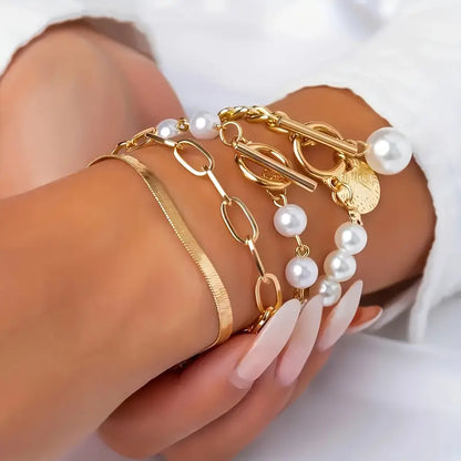 Chique gouden 4-delige armbandenset – slangenketting, parels en schakels | Goud