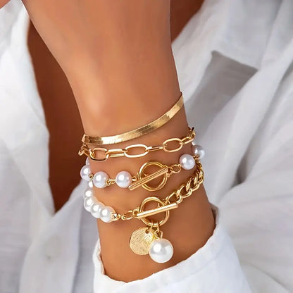 Chique gouden 4-delige armbandenset – slangenketting, parels en schakels | Goud