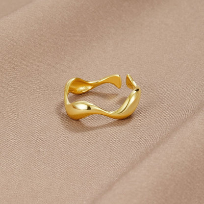 Elyra ring met vloeiende lijnen | Goud