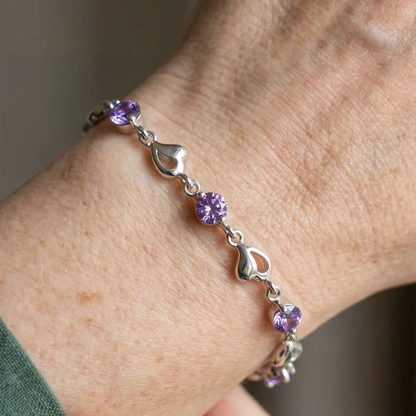 Armband met hartjesbedel en amethist | Witgoud