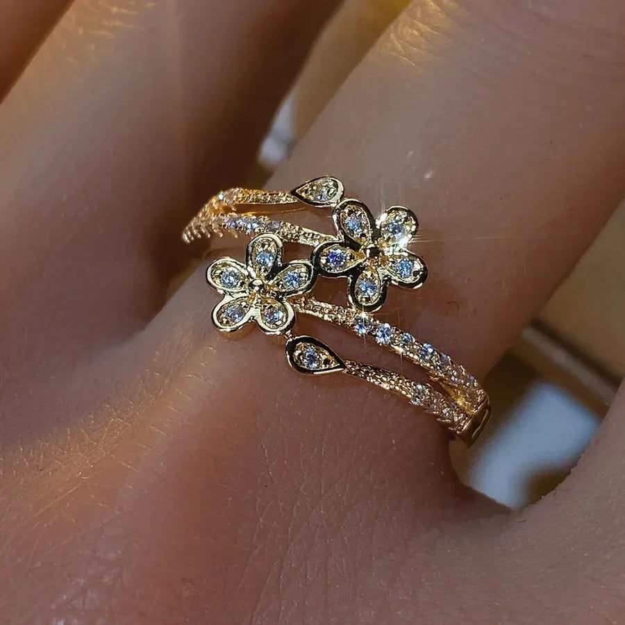 Elegante stralende gouden bloemenring | Goud