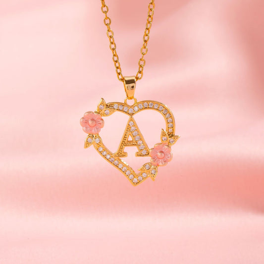 Ketting met initiaal en bloemenbedel | Goud