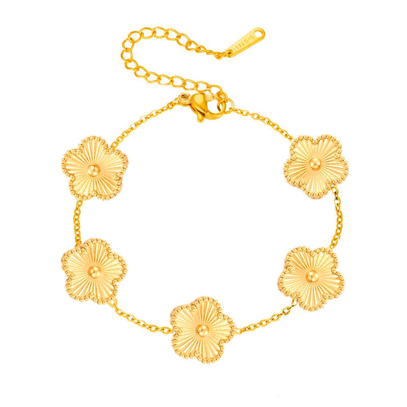 Florielle armband met bloemenbedel | Goud