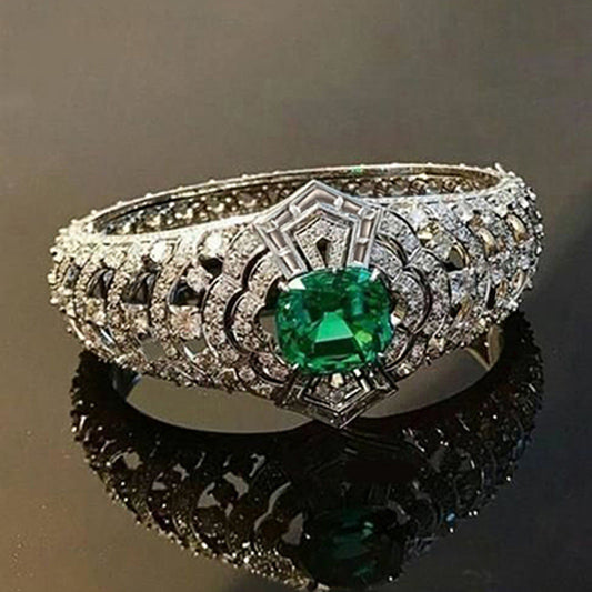 Art-deco-ring met smaragd | Witgoud