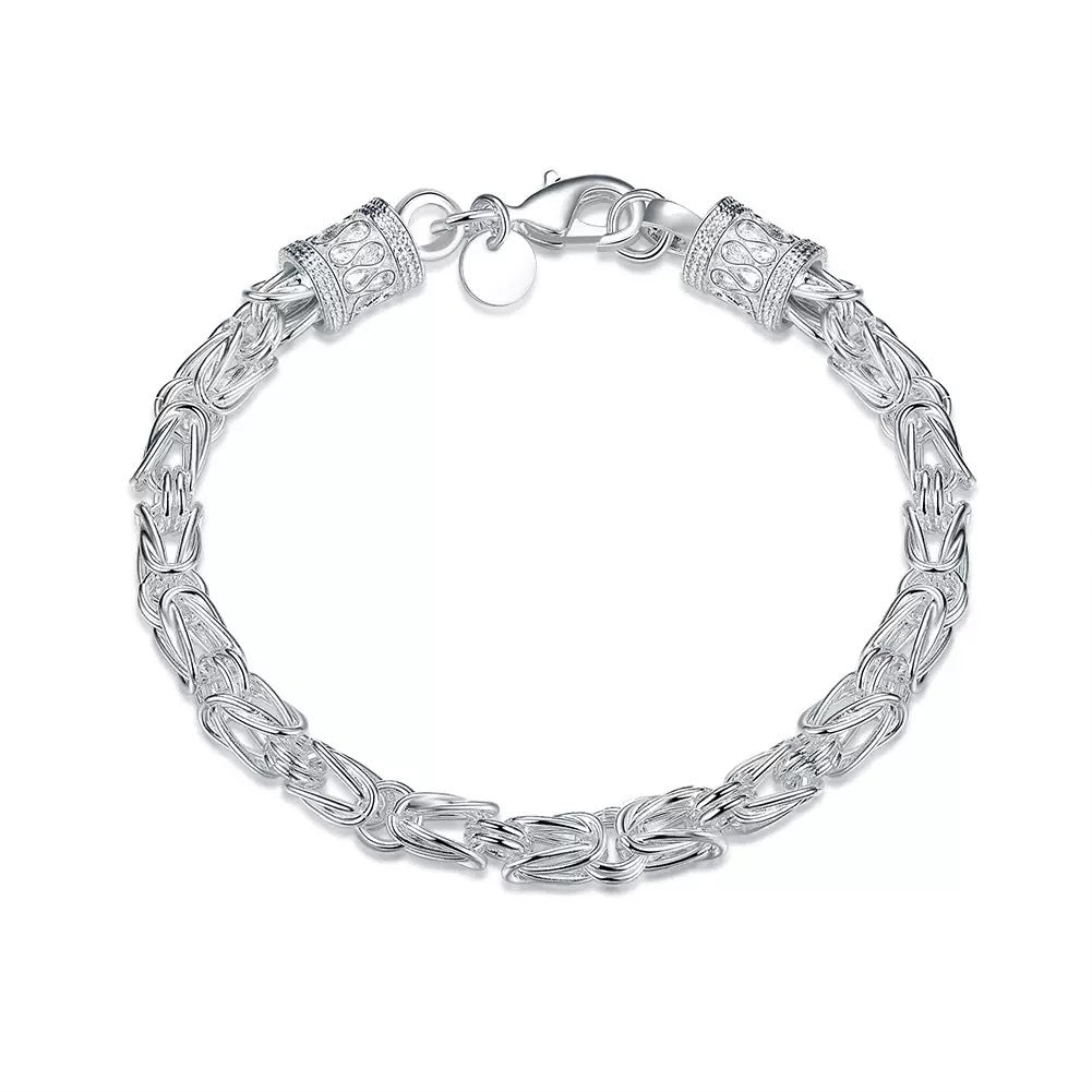 Maximus armband met koninklijk vlechtwerk | Witgoud