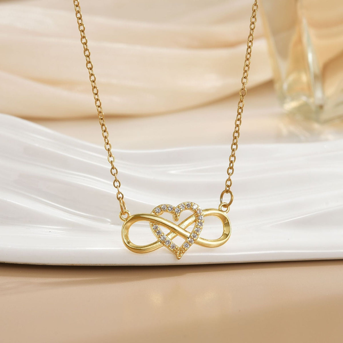 Liefdesknoop-ketting met oneindigheidssymbool | Goud