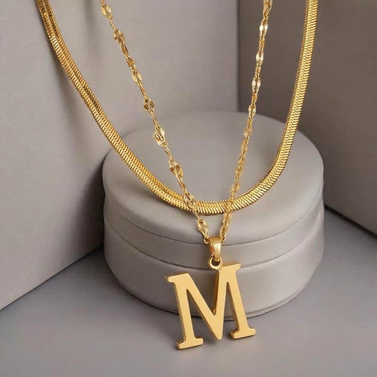 Gelaagde ketting met initiaal | Goud