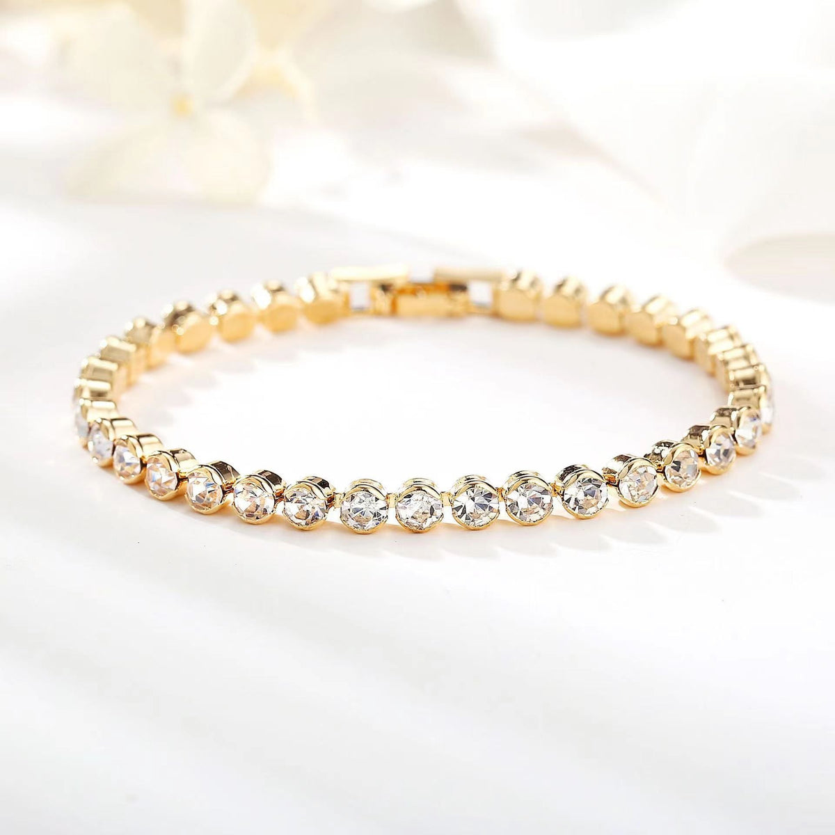 Tennisarmband met rondgeslepen stenen | Goud