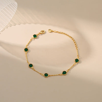 Schakelarmband met smaragd | Goud