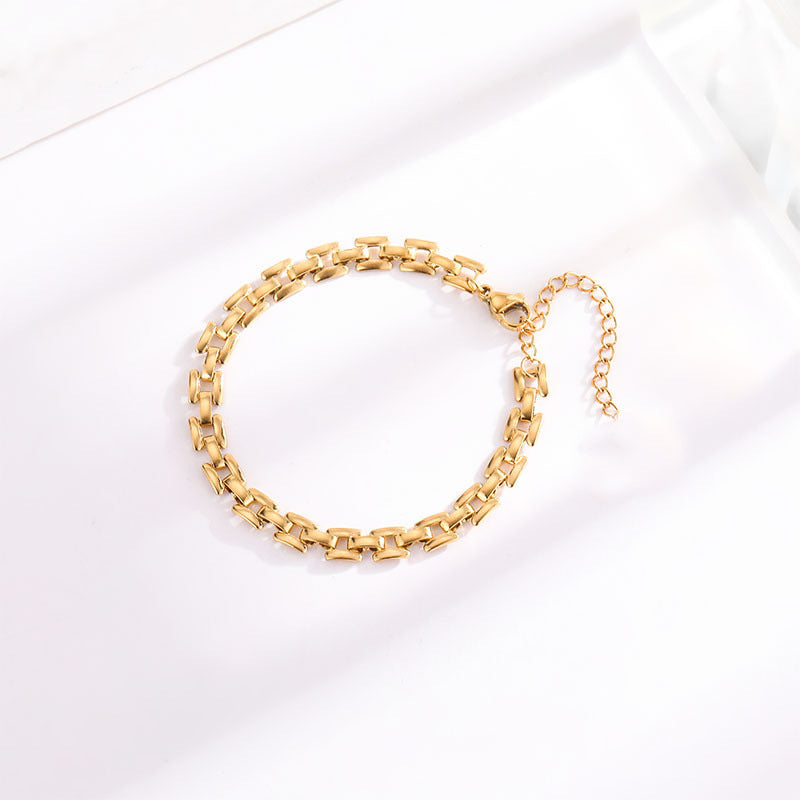 Timepiece schakelarmband | Goud