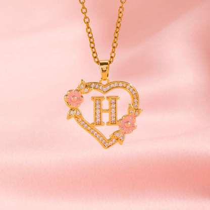 Ketting met initiaal en bloemenbedel | Goud