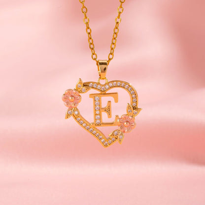 Ketting met initiaal en bloemenbedel | Goud