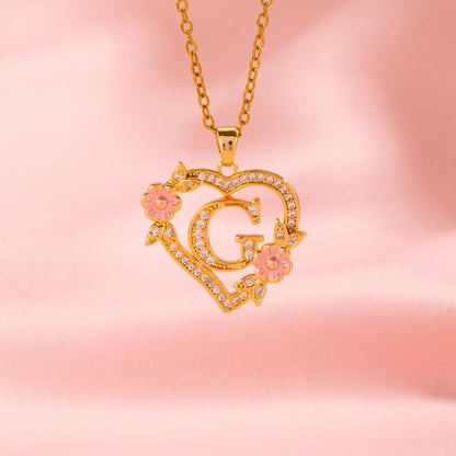 Ketting met initiaal en bloemenbedel | Goud