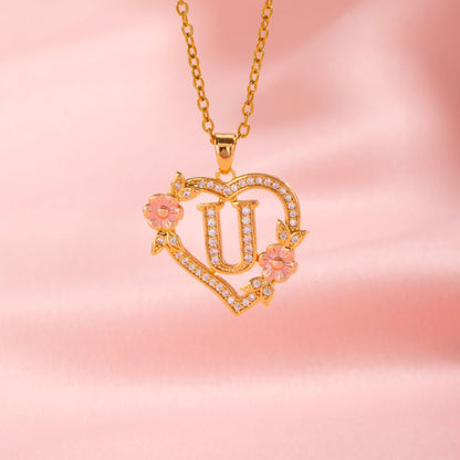 Ketting met initiaal en bloemenbedel | Goud