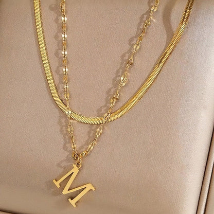 Gelaagde ketting met initiaal | Goud