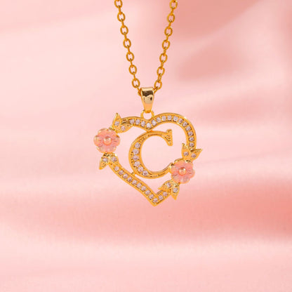 Ketting met initiaal en bloemenbedel | Goud