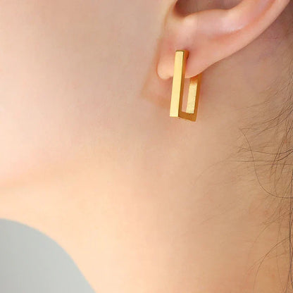 Terrafin Geometrica oorbellen | Goud