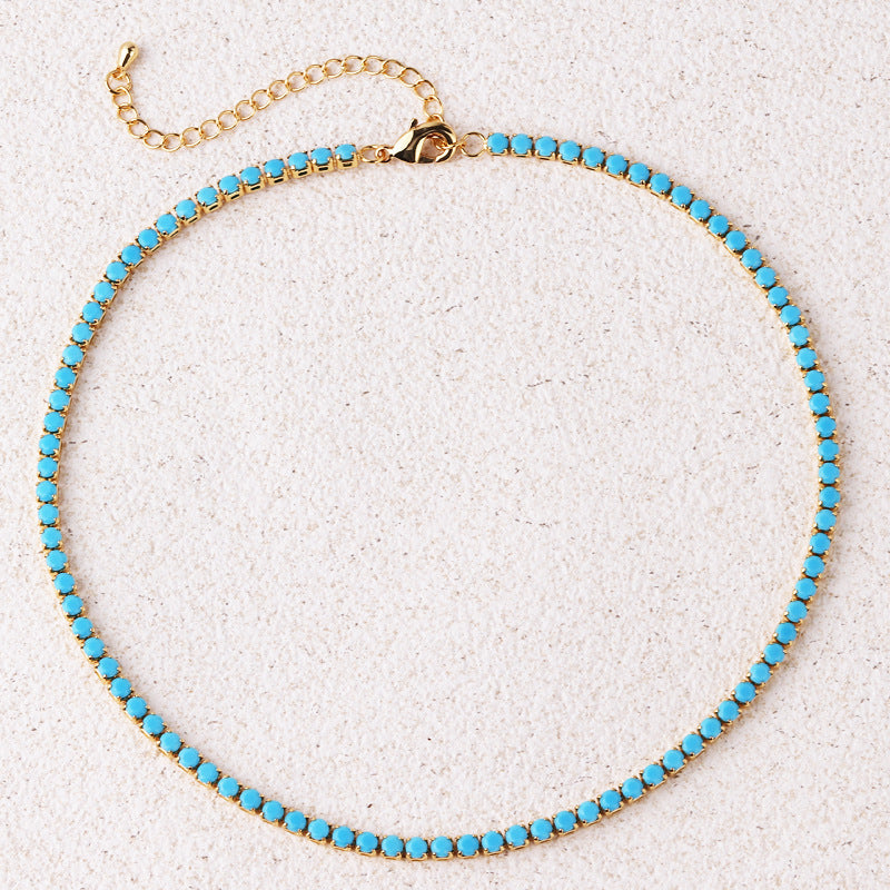Tennisketting met ronde turkooizen stenen | Goud