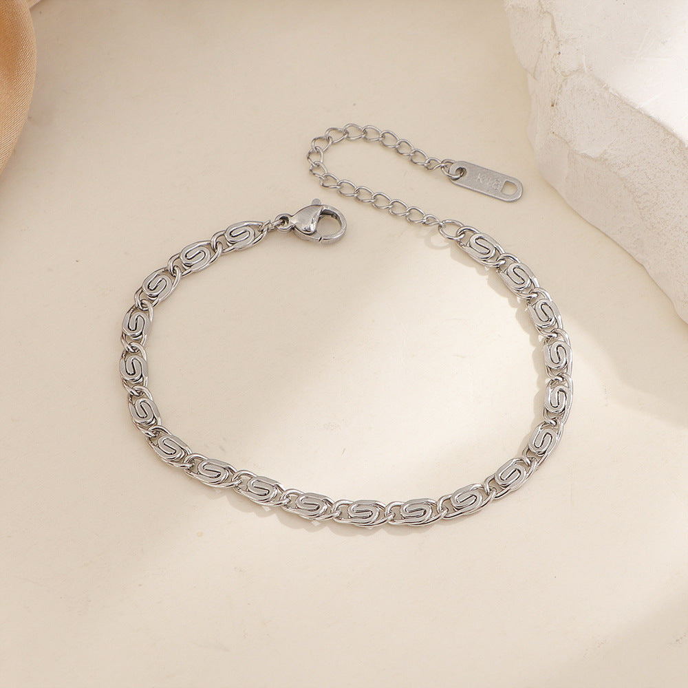 Nusa gevlochten schakelarmband | Witgoud