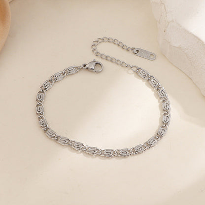 Nusa gevlochten schakelarmband | Witgoud