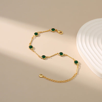 Schakelarmband met smaragd | Goud