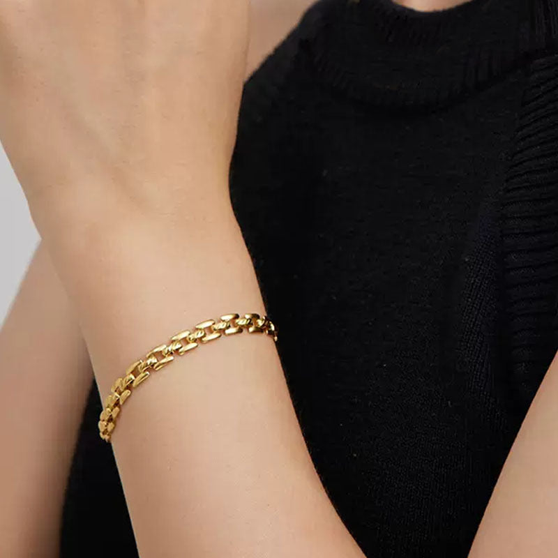 Timepiece schakelarmband | Goud