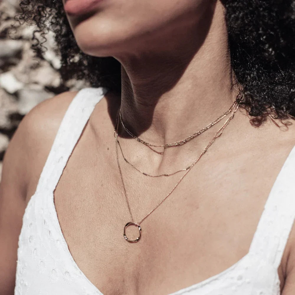 Drierijige ketting met open cirkel | Goud