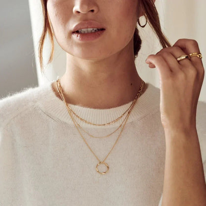 Drierijige ketting met open cirkel | Goud