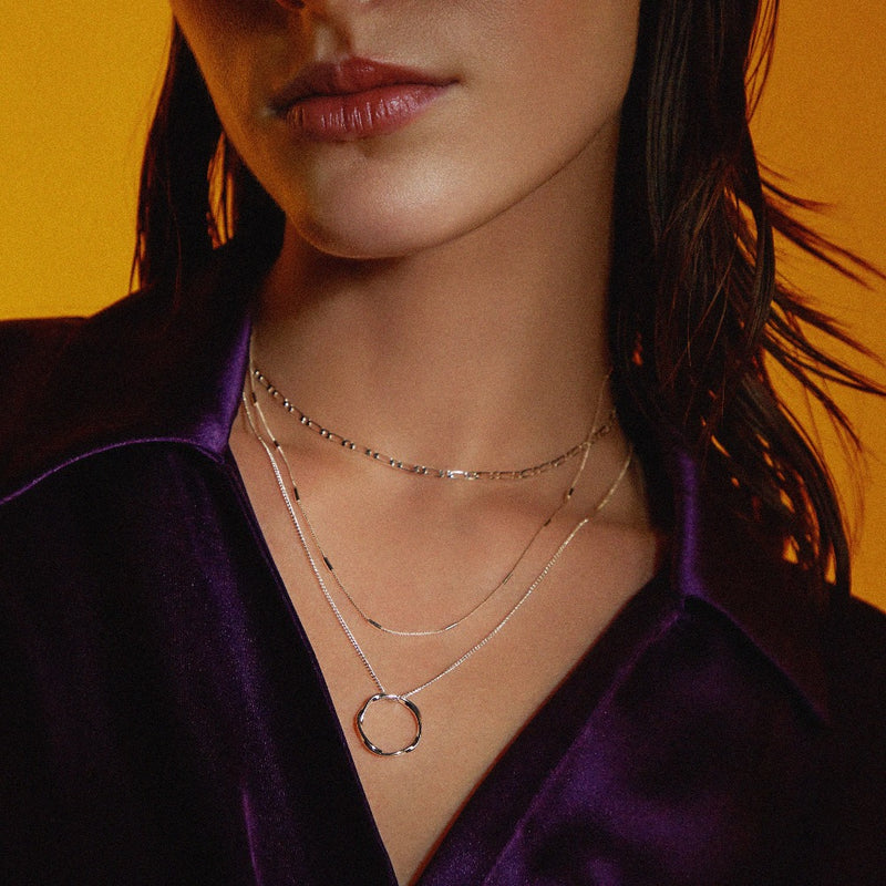 Drierijige ketting met open cirkel | Witgoud