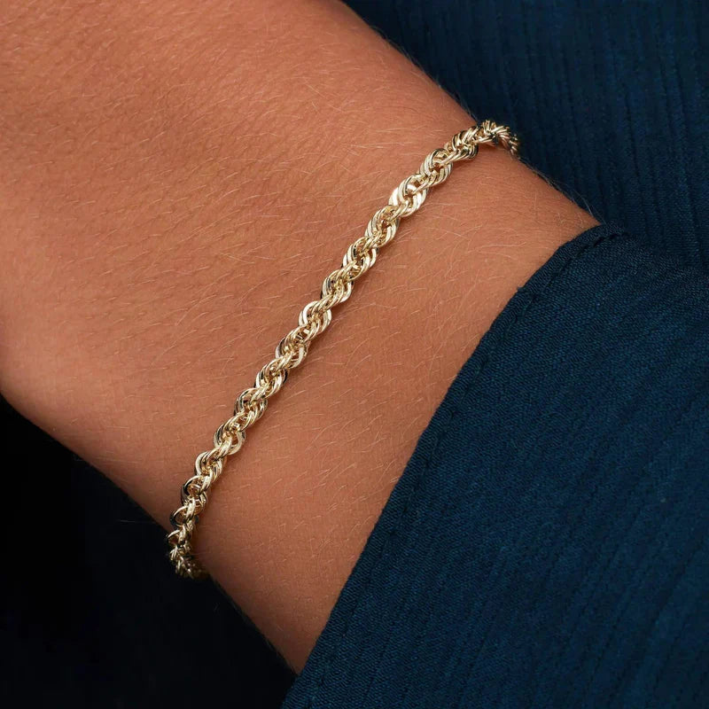 Gedraaide schakelarmband | Goud