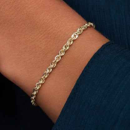 Gedraaide schakelarmband | Goud