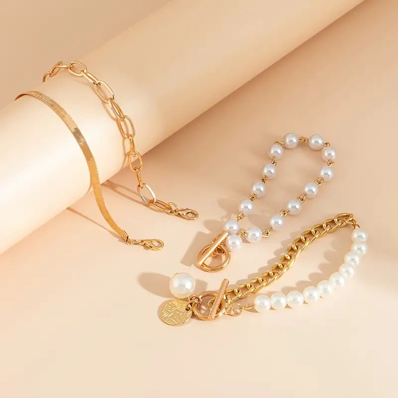 Chique gouden 4-delige armbandenset – slangenketting, parels en schakels | Goud