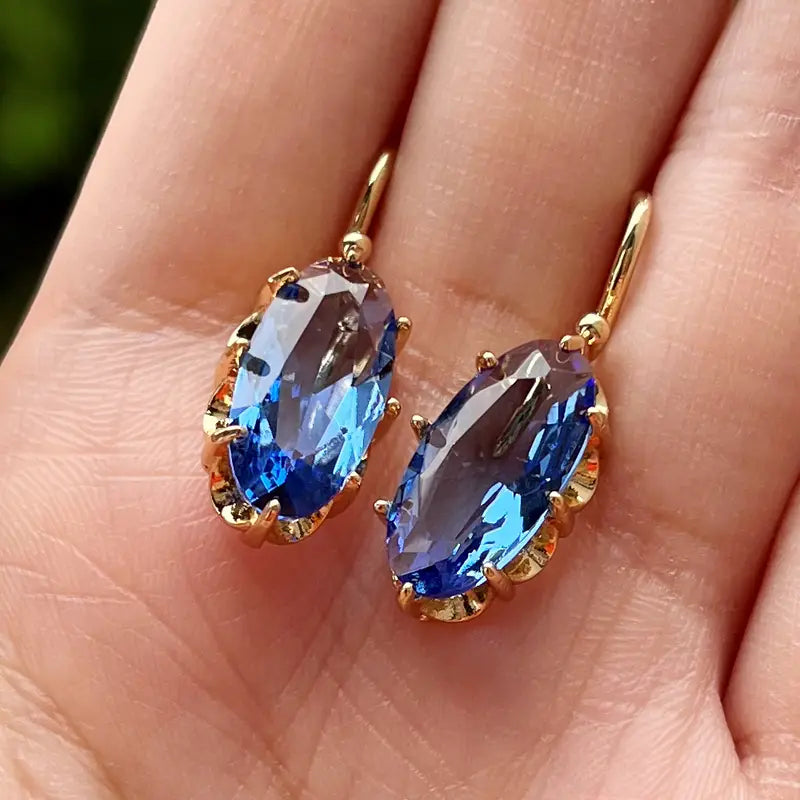 Gouden oorbellen met blauwe bloem | Goud