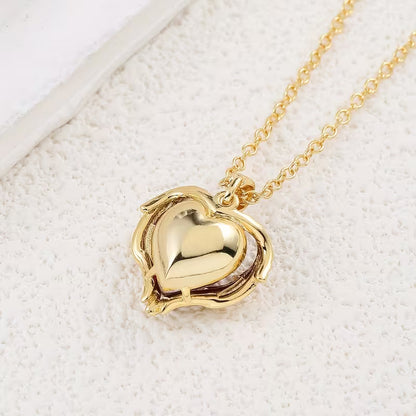Engelenomhelzing-ketting met robijnen hart | Goud