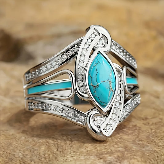 Opvallende ring met marquisevormige turkoois | Witgoud