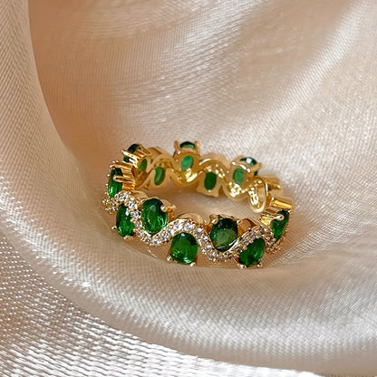 Calira sprankelende open ring met smaragd | Goud