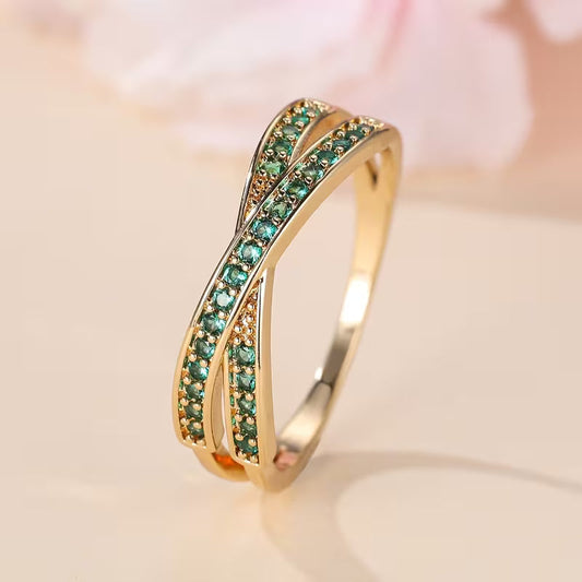 Ring met smaragd en vloeiende lijnen | Goud