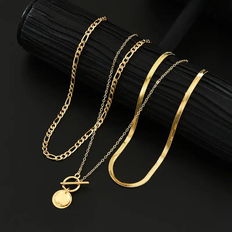 Savira gelaagde ketting met getextureerde munt | Goud