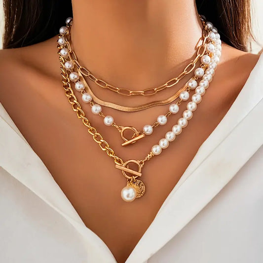 Vintage kettingenset met parels en gouden slangenketting | Goud