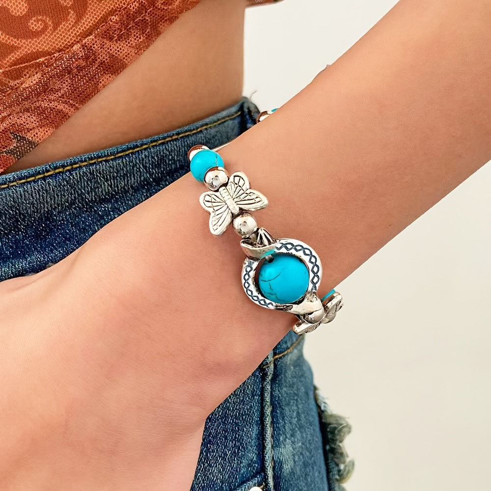 Oasis armband met zwevende vlinder | Witgoud